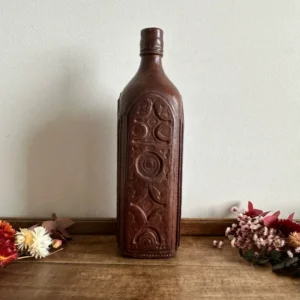 Bouteille recouverte de cuire
