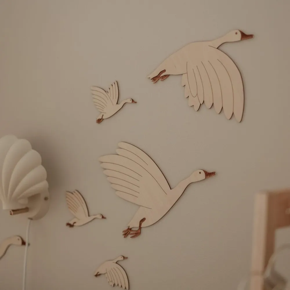 Décoration murale en bois avec oies