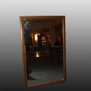 Grand miroir symétrique rectangulaire doré de style Louis XVI du 20ème siècle