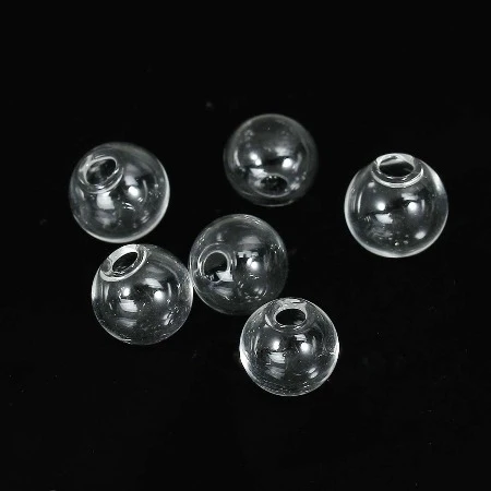 BOULE FLOTTANTE EN VERRE GM-7X6X6CM-TRANSPARENTE SET DE 6PCS ORCA-DECO_NW