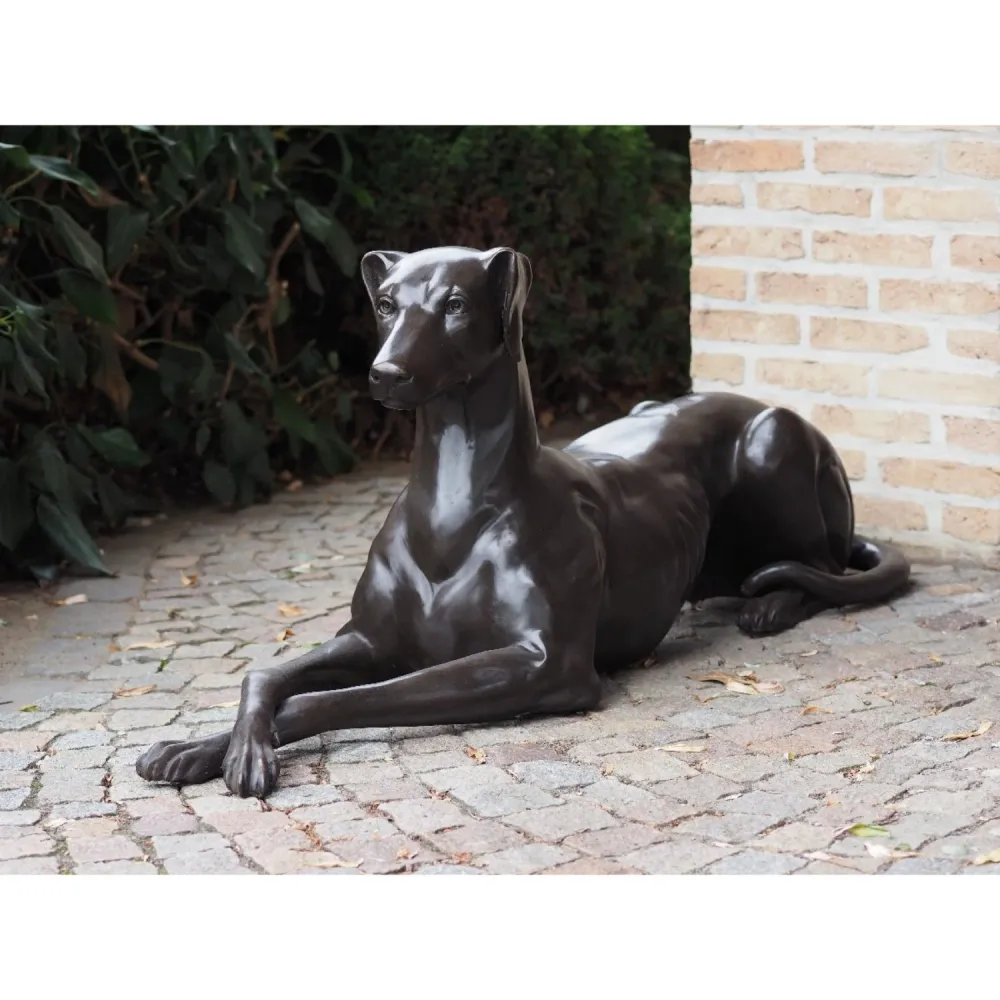 Statue en bronze Chien couché à droite 51x31x130cm (HxLxL)