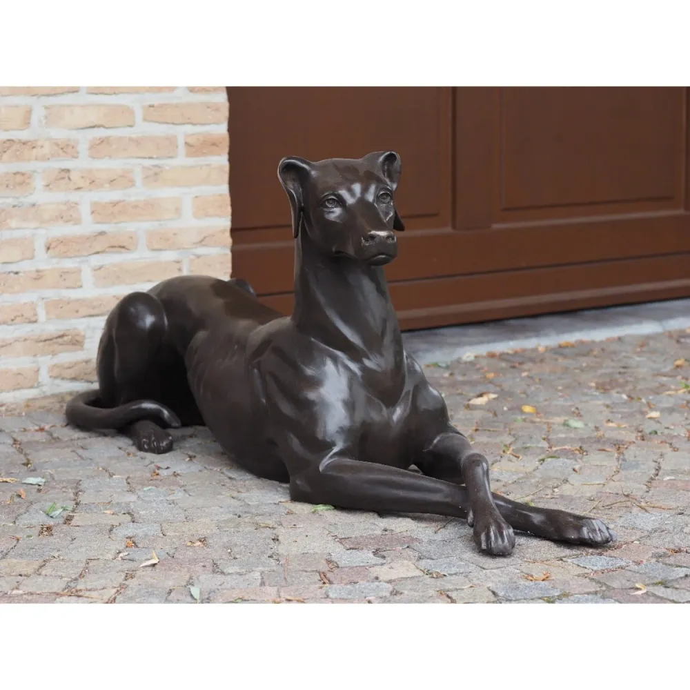 Statue en bronze Chien couché à gauche 51x31x130cm (HxLxL)